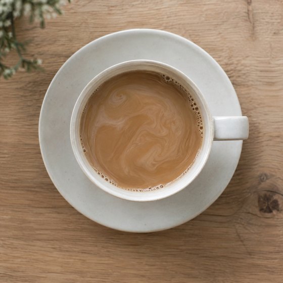 カフェオレ。白いカップに注いだもの